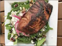  ?? CONTRIBUTE­D BY PAULA PONTES ?? BOTTOM LEFT: At Chapman Drug, you can enjoy local Jakes’ ice cream as a cone, in a shake, a malt or a float. Grilled Faroe Island salmon over a spinach salad at Volare Bistro in Hapeville.