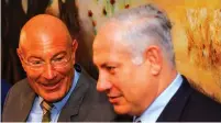  ?? (Flash90) ?? BILLIONAIR­E MOVIE PRODUCER Arnon Milchan speaks with long-time friend Prime Minister Benjamin Netanyahu during a press briefing at the Knesset in this file photo.