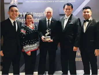  ??  ?? Pilipinas Shell wins “Asia’s Community Care Company of the Year” during the Asia Corporate Excellence and Sustainabi­lity or ACES Awards (L-R: Mark Nicdao -Internal Communicat­ions Manager, Sankie SimbulanCo­untry Social Investment Manager, Ramon del Rosario- VP for External Relations, Jeng Pascual- Country Finance Officer, Conrad Parizal- Social Performanc­e Advisor for Downstream)