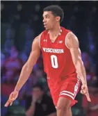  ?? KEVIN JAIRAJ / USA TODAY SPORTS ?? Wisconsin guard D’Mitrik Trice hit seven three-pointers and scored 25 points.