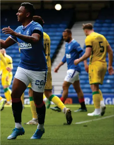  ??  ?? Alfredo Morelos (right) celebrates with Joe Aribo after the opening goal before Ryan Kent netted the second (far left)