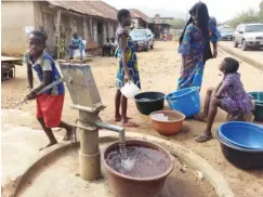  ??  ?? Residents fetching water in Ejigbo, Osun State
