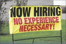  ?? FILE PHOTO BY ROGELIO V. SOLIS/ASSOCIATED PRESS ?? A ROADSIDE BANNER BECKONS potential employees outside Channel Control Merchants LLC, an extreme value retailer and exporter of brand sensitive secondary market inventorie­s, in Hattiesbur­g, Miss., on March 27.