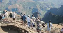  ?? JOE KAFKA/ THE ASSOCIATED PRESS FILES ?? Tourists view Waimea Canyon on the island of Kauai, Hawaii. The natural wonder has been dubbed the Grand Canyon of the Pacific.