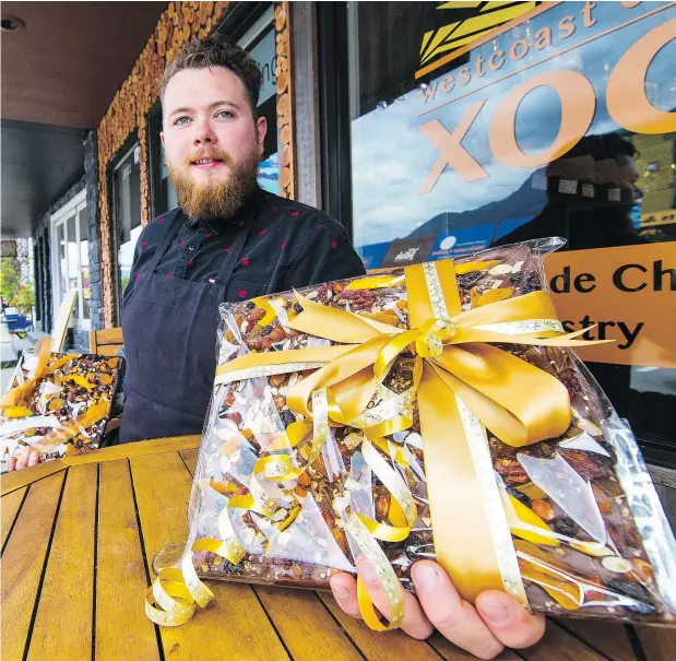  ?? FRANCIS GEORGIAN ?? Kevin Young returned to Squamish three years ago with his mother to open Xoco Westcoast Chocolate downtown.