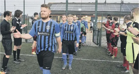  ??  ?? Peterborou­gh Premier Division champions Moulton Harrox are given a guard of honour by 2017-18 top dogs Netherton United before their weekend game.