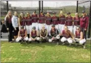  ?? PHOTO BY PETER WALLACE ?? Torrington High School’s softball team cemented its bonds with a spring break trip to Florida last week, going undefeated over a five-game span at the ESPN sports complex.