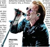  ?? ?? PRAYER: Bono performing with U2
