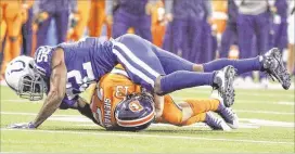  ?? SAM RICHE / TNS ?? Broncos QB Trevor Siemian hurt his left shoulder on this sack by Colts linebacker Barkevious Mingo on Thursday night and was placed on injured reserve.