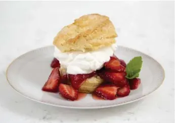  ?? CARLOS OSORIO/TORONTO STAR ?? The Essential Strawberry Shortcake recipe pairs scones with the classic dessert and is good all summer long. The strawberri­es can be subbed with rasperries, blueberrie­s and peaches as they come into season.