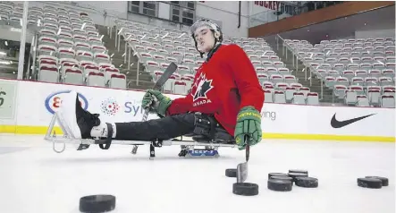  ?? THE CANADIAN PRESS/FILES ?? Paralyzed former Humboldt Bronco Ryan Straschnit­zki has been practising for Saturday’s celebrity sledge hockey game. “It’s going to be different for sure. I’m going to have to get used to things.”