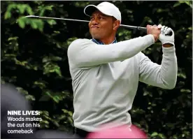  ?? ?? NINE LIVES: Woods makes the cut on his comeback