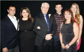  ??  ?? Dr. David Ratcliff, Eagle Award honoree, third from left, is joined by his family, Adam Ratcliff, from left, Kathryn Doland, Jason Ratcliff, Cynthia Ratcliff and Kristan Hinn at the Washington Regional Gala on Tuesday evening.