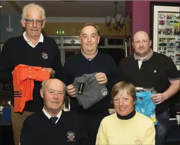  ??  ?? The presentati­on in New Ross after the St. Patrick’s fourball competitio­n sponsored by 4 Star Pizza. Back (from left): John Murphy (second), Ger Freaney (third), James O’Brien (nearest the pin). Front (from left): Peter Goggin (President), Teresa Foley...