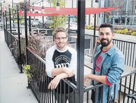 ?? BOB TYMCZYSZYN THE ST. CATHARINES STANDARD ?? DrewWillia­ms, left, and Nick Mirka are two of three co-hosts for the comedic new Niagara web series on craft breweries, Tales from the Ale Trail.