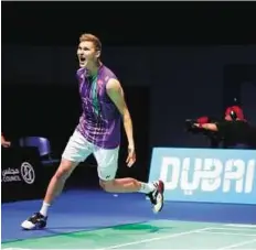  ?? AFP ?? Viktorious Viktor Axelsen of Denmark celebrates after beating world number one Chen Long of China in their semi-final match.