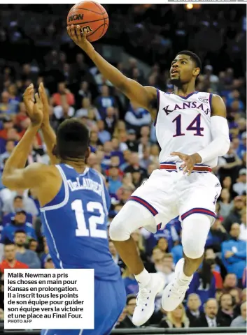  ?? PHOTO AFP ?? Malik Newman a pris les choses en main pour Kansas en prolongati­on. Il a inscrit tous les points de son équipe pour guider son équipe vers la victoire et une place au Final Four.