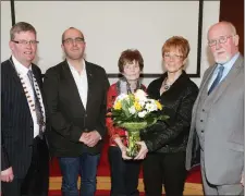  ??  ?? Clr. Margaret Gormley making a presentati­on to Helen MacManus with Cathaoirle­ach of Sligo County Council, Clr. Hubert Keaney, Chris MacManus and Clr. Sean MacManus.