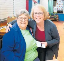  ??  ?? At the Dannevirke Cottage Quilters two-day exhibition last weekend Anne Ingram, left, sponsored an encouragem­ent award, won by Diana Morris, right.