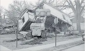  ?? ST. CATHARINES MUSEUM ?? Homes are demolished at the corner of Raymond and Clark streets in April 1978.