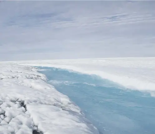  ??  ?? 0 A melt stream on the Greenland ice sheet as melting has accelerate­d to unpreceden­ted rates in the face of rising temperatur­es