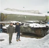 ?? UKRAINIAN PRESIDENTI­AL PRESS OFFICE ?? Ukrainian President Volodymyr Zelenskyy, left, and British Prime Minister Rishi Sunak examine a captured Russian tank Saturday in Kyiv.