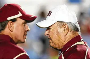  ?? Getty Images file ?? Jimbo Fisher, left, and Bobby Bowden, shown coaching together at Florida State in 2009, enjoyed a relationsh­ip that spanned four decades. Said Fisher: “The Bowden family was my roots.”