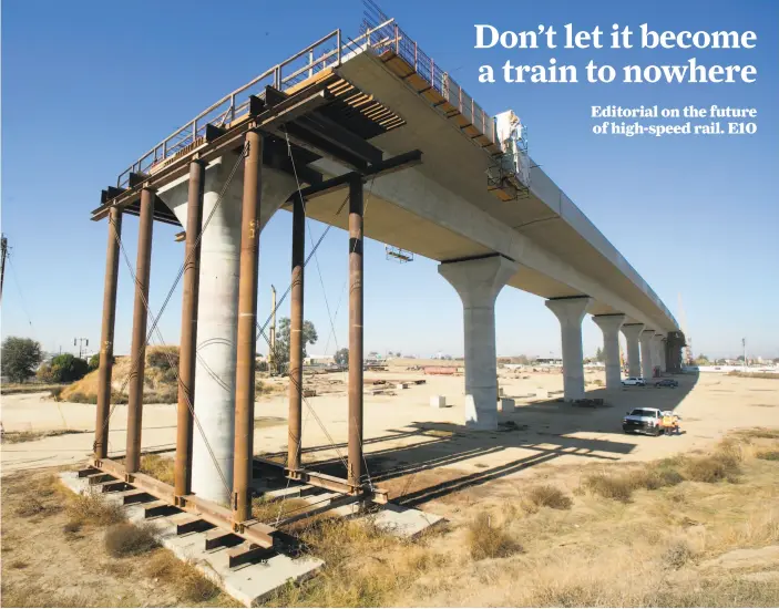  ??  ?? An elevated section of California’s high-speed rail is under constructi­on near Fresno. An audit may show cost overruns and delays, but it would be a benefit.