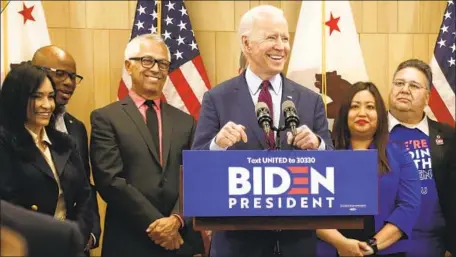  ?? Genaro Molina Los Angeles Times ?? JOE BIDEN told reporters in Westwood that he wanted “to build a movement” with “a progressiv­e vision” to beat President Trump.