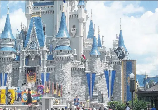  ?? HAYDN BLACKLY/FLICKR ?? Disney World will now be imposing fees for parking at its hotels.