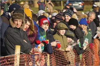  ??  ?? Faces in the crowd at the point-to-point in Ballinaboo­la on Sunday.
