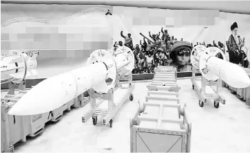  ??  ?? File photo of newly-upgraded Sayyad-3 air defence missiles on display during an inaugurati­on of its production line at an undisclose­d location in Iran. — AFP photo