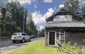  ?? NYS Office of Parks / Friends of East Gate ?? A Columbia County landmark along Route 23 in the town of Hillsdale would be moved about 30 feet to protect it from the highway.