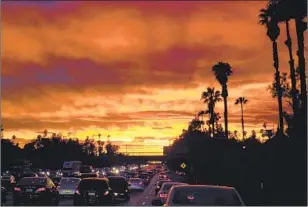  ?? Reed Saxon Associated Press ?? TRAFFIC on the Santa Monica Freeway in 2015. To this day, it remains one of the few freeways in Los Angeles without high-occupancy vehicle lanes.