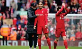  ?? ?? Jürgen Klopp and Virgil van Dijk congratula­te each other after Liverpool’s 2-0 win against Watford on Saturday. Photograph: Paul Greenwood/Shuttersto­ck