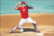  ?? MATT SLOCUM — THE ASSOCIATED PRESS ?? In this July 6, 2020, file photo, Philadelph­ia Phillies’ J.T. Realmuto throws to second base during baseball practice at Citizens Bank Park in Philadelph­ia.