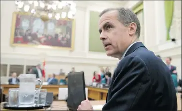  ?? Adrian Wyld/the Canadian Press ?? Bank of Canada Governor Mark Carney said government restraint is putting a speed limit on the economy, but not as much as some suppose.