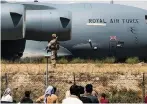 ??  ?? UK Armed Forces taking part in the evacuation of entitled personnel from Kabul airport