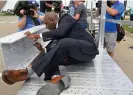  ?? Kansas City Star/TNS ?? Kansas City mayor Quinton Lucas helped the KC Current celebrate a milestone when he signed the final beam that constructi­on crews hoisted into place in June. Photograph: