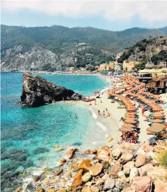  ?? ?? Hot stop: derail your express travel plans with a beach day at Monterosso, Italy