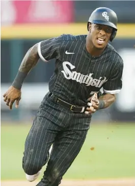  ?? ARMANDO L. SANCHEZ/CHICAGO TRIBUNE ?? White Sox shortstop Tim Anderson rounds the bases on an RBI double from Andrew Vaughn on June 20 at Guaranteed Rate Field.