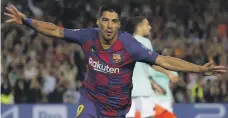  ?? AP ?? Luis Suarez struck two goals for Barcelona during an improved display in the second half against Inter Milan at Camp Nou
