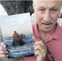  ??  ?? JOHNNY Vassilaros with his book Little Boats & Big Fish … And Big Snakes Too.