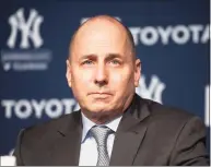  ?? Mark Lennihan / Associated Press ?? Yankees general manager Brian Cashman has watched the team struggle this season.