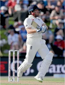  ?? PHOTO: AP ?? England batsman Jonny Bairstow is struck on the visor which knocked his helmet off while batting agaimnst New Zealand on the first day of the sec ond cricket at Hagley Oval yesterday.