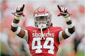  ?? [PHOTO BY BRYAN TERRY, THE OKLAHOMAN] ?? Oklahoma’s Brendan Radley-Hiles gestures toward the crowd before a game against UCLA on Sept. 8.