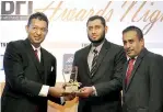  ??  ?? Ilsam Awfer – AM-IBD Accepting the Award together with Jude Anthony – DGM-Channels