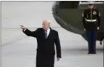  ?? SUSAN WALSH — THE ASSOCIATED PRESS ?? President Donald Trump gestures as he walks towards Air Force One at John F. Kennedy Internatio­nal Airport in New York, Saturday. Trump spent the day in New York attending a trio of fundraiser­s.