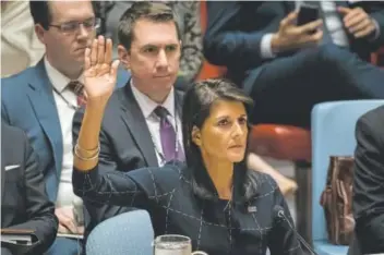  ?? Drew Angerer, Getty Images North America ?? Nikki Haley, U.S. ambassador to the United Nations, votes Monday to levy new sanctions on North Korea designed to curb the country’s nuclear ambitions.