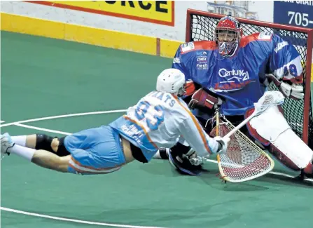  ?? CLIFFORD SKARSTEDT/EXAMINER ?? Peterborou­gh Century 21 Lakers goalie Matt Vinc stops Six Nations Chiefs' Randy Staats during Major Series Lacrosse Final Game 5 action on Tuesday night at the Memorial Centre. The Lakers lost 8-6 but lead the series 3-2. See more photograph­s from the...